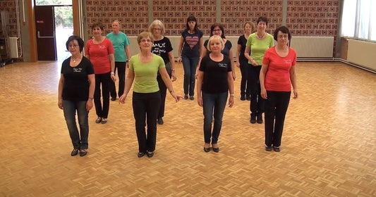Seniors Go All Out To 'Let’S Twist Again' Line Dance
